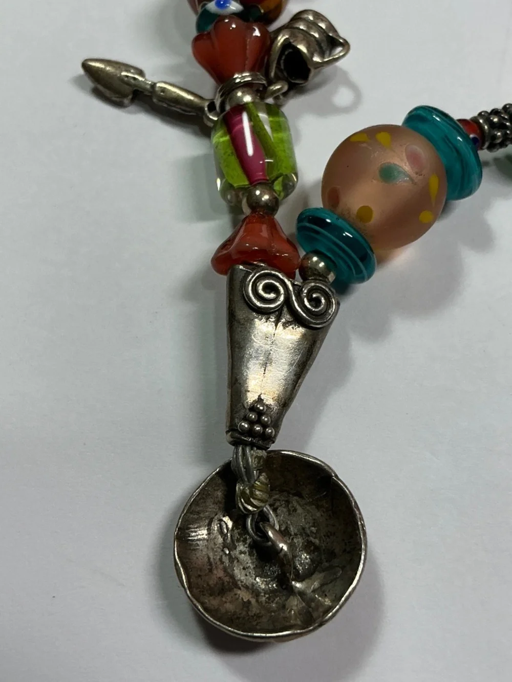 Sterling Silver and Lampwork glass beads W/ 4 Sterling Silver charms. 7.5” long